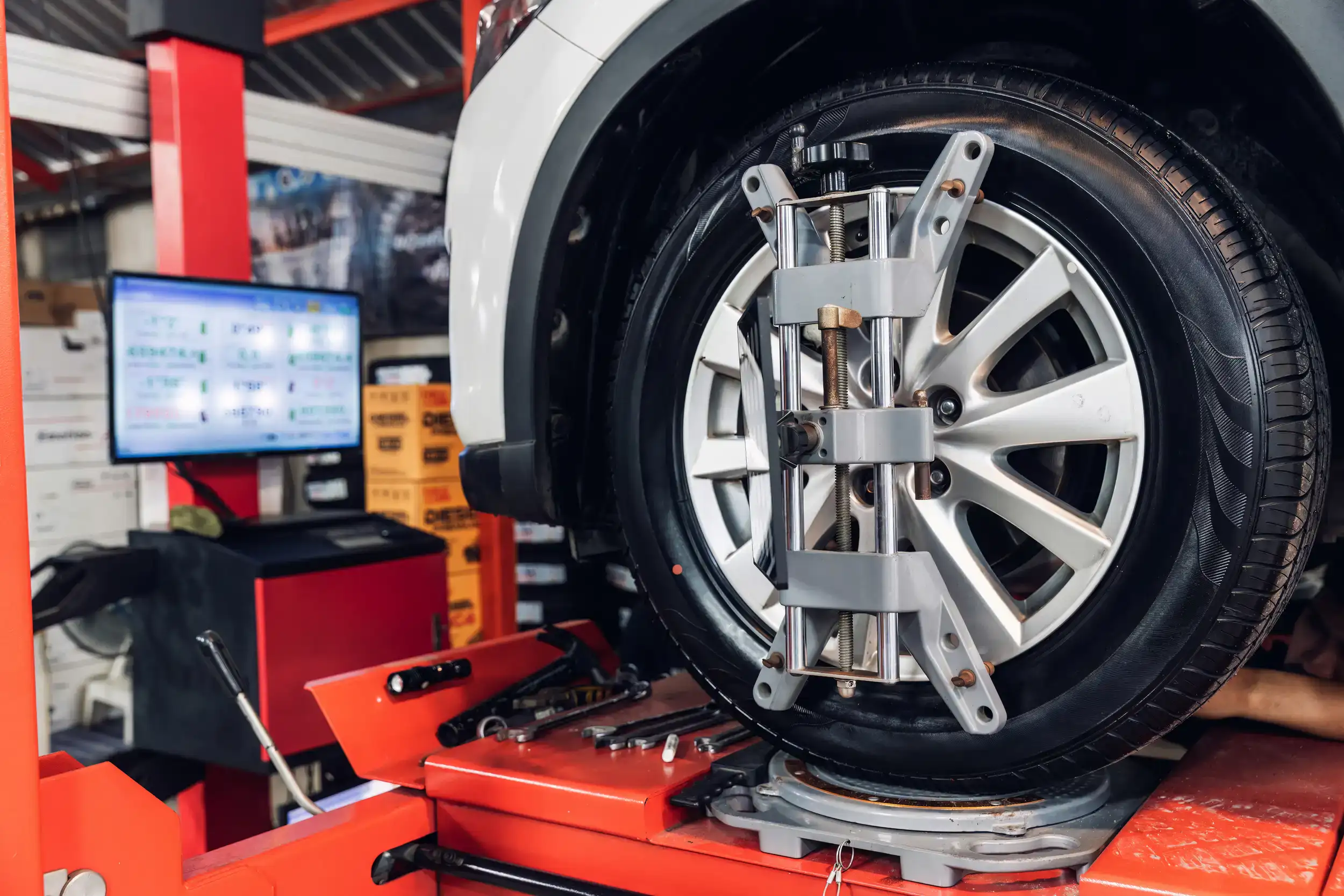 A car wheel being tested in a machine.